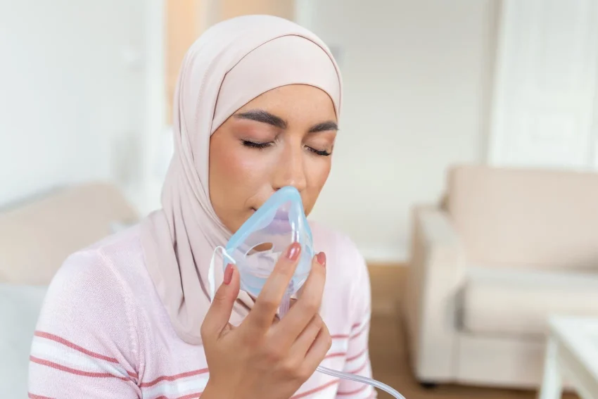 Girl on nebulizer